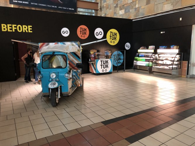 blue food cart setup with beverage, sandwich and salad options for sale